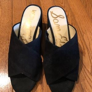 Black suede criss cross slides